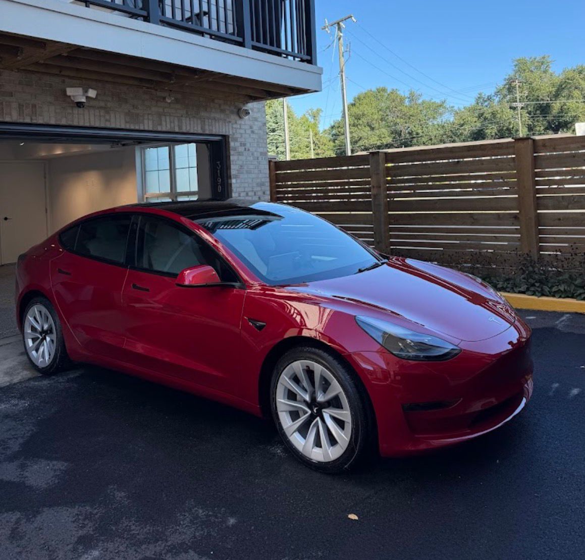 Tesla Model 3 red exterior detailing Baltimore